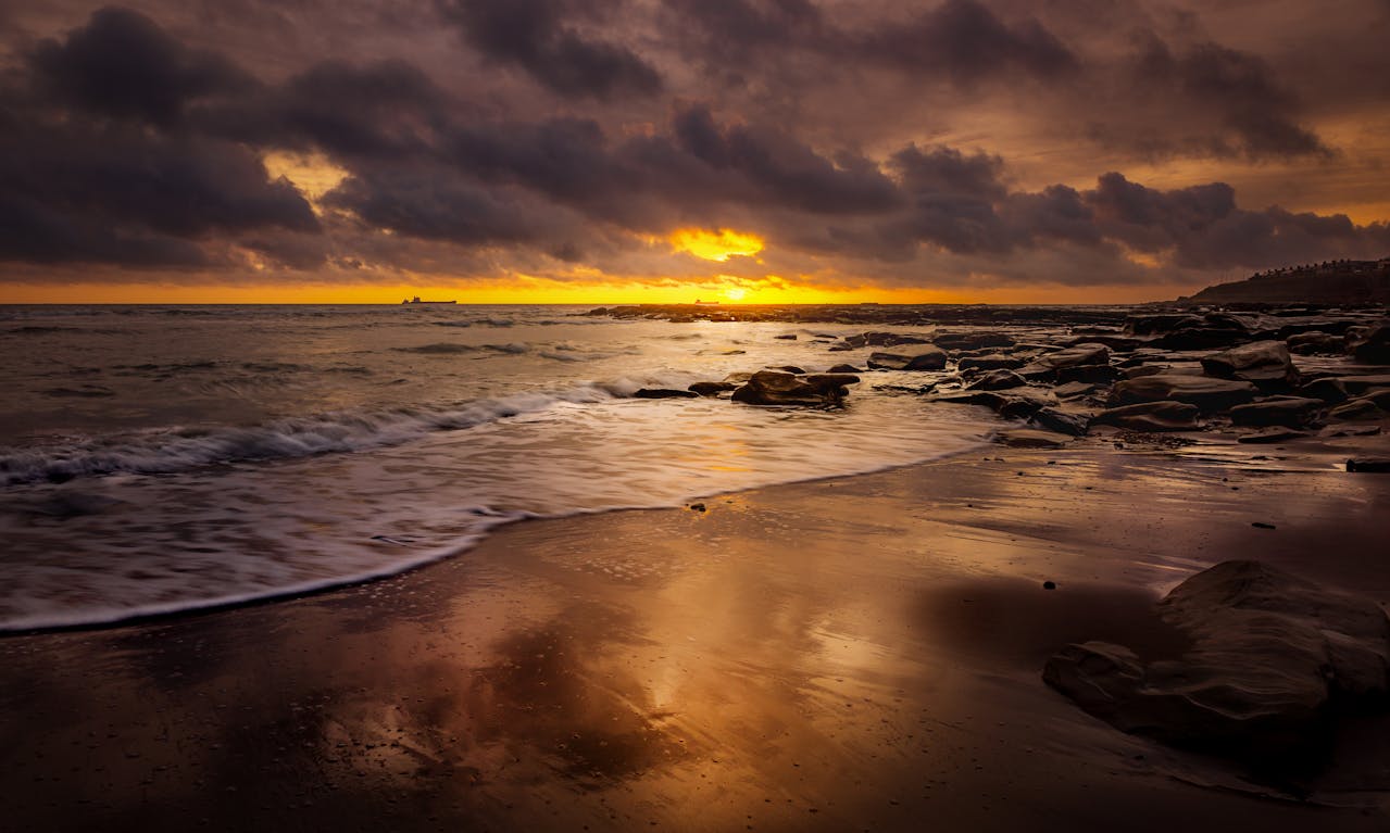 image of a beach in the evening